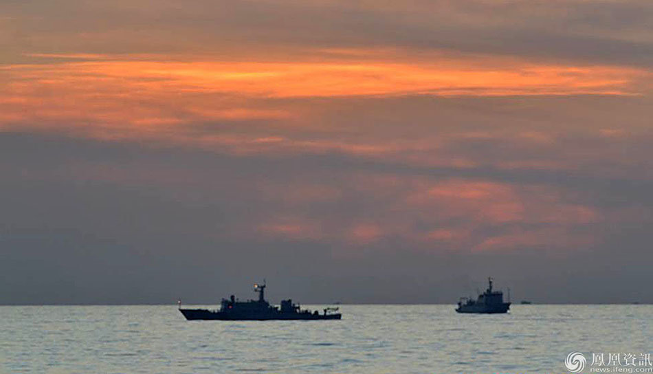 (FILES) This undated file handout photo taken by the Philippine Navy and released on April 11, 2012 by the Department of Foreign Affairs shows Chinese surveillance ships off scarborough Shoal. The Philippines said April 13, 2012, it had made progress in efforts to end a tense standoff with China in the South China Sea but each side was still refusing to remove its ships from the disputed area. AFP PHOTO / DFA / Philippine Navy / FILES ---EDITORS NOTE--- RESTRICTED TO EDITORIAL USE MANDATORY CREDIT "AFP PHOTO / DFA / Philippine Navy" --- NO MARKETING NO ADVERTISING CAMPAIGNS - DISTRIBUTED AS A SERVICE TO CLIENTS (Photo credit should read Philippine Navy/AFP/Getty Images)