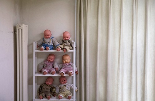 BEIJING, CHINA - OCTOBER 28:  Plastic babies used in instruction to teach Chinese women to be qualified nannies, known in China as ayis, are seen on a shelf in a class at the Ayi University on October 28, 2016 in Beijing, China. The Ayi University training program teaches childcare, early education, housekeeping, and other domestic skills. The eight-day course costs US $250, and provides successful participants with a certificate to present to prospective employers. Most of the women attending the program are migrants from villages and cities across China who have moved to the capital to earn income to send home to their own families. China's burgeoning middle class has boosted demand for domestic help in urban areas, and the need for qualified childcare is expected to grow. In 2015, the government dismantled its controversial 'one child policy' as a means of rebalancing China's aging population in order to stave off a demographic crisis. Couples are now allowed to have two children, though the availability and cost of quality childcare is cited as an obstacle for many middle class parents who want larger families.   (Photo by Kevin Frayer/Getty Images)