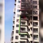 女子在大火中从6楼跳下 楼下居民大喊: 别跳